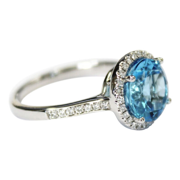 Ladies Blue Topaz and Diamond Ring