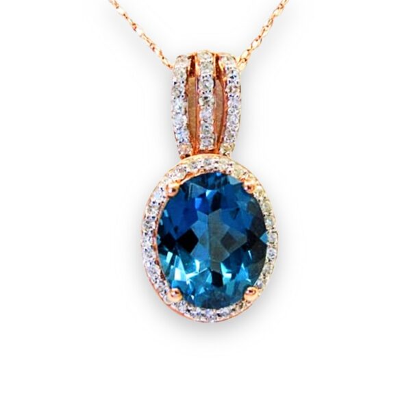 Ladies Blue Topaz and Diamond Pendant